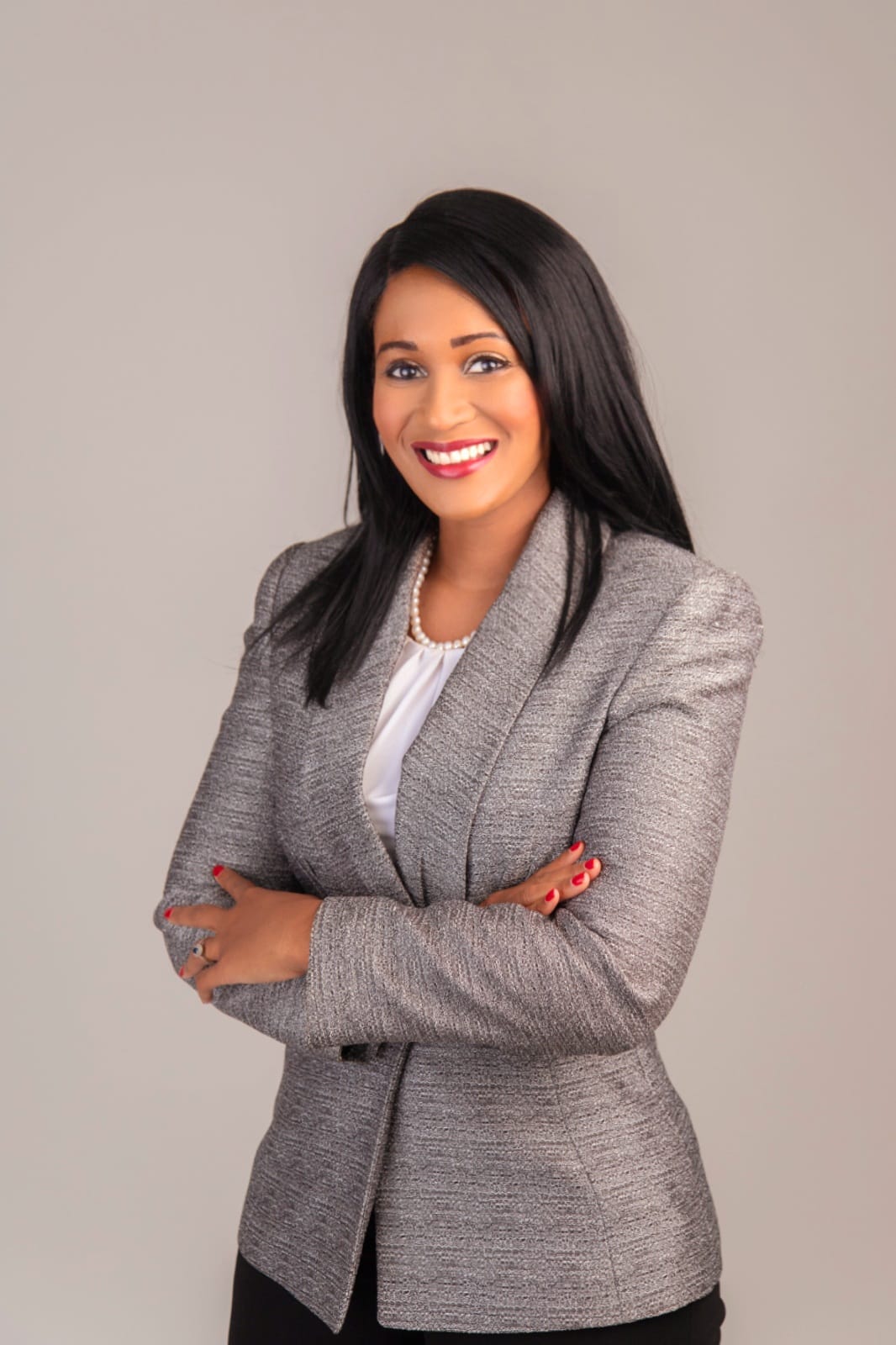 Portrait of Ashley E. Delpeche, Founder and Executive Director